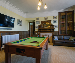 Pool and TV at Sandside House